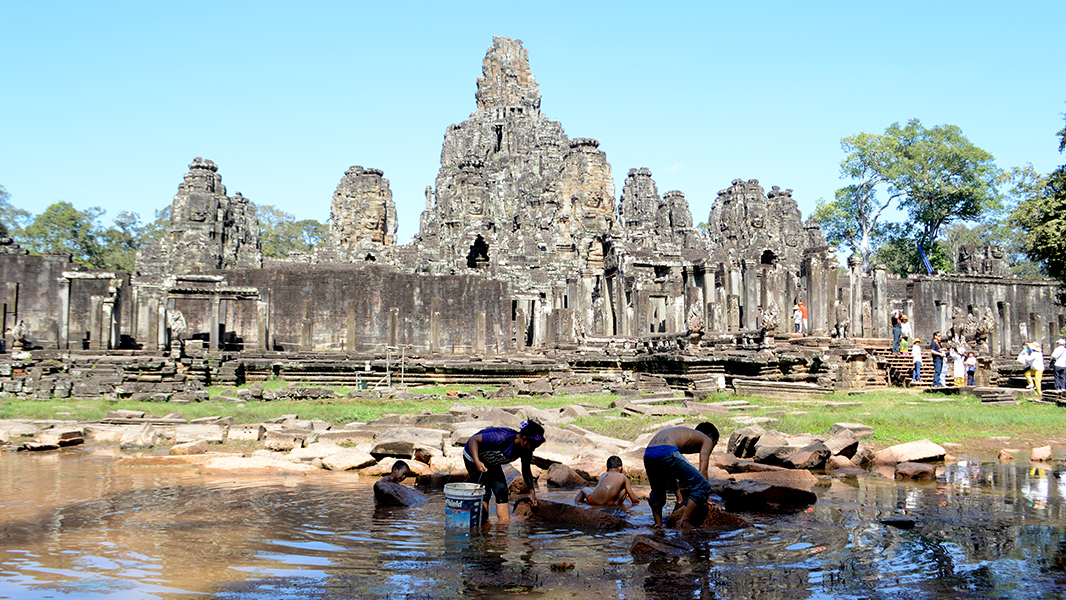 Discover the mysterious stone faces of Bayon Temple, the iconic masterpiece at the heart of Angkor Thom.