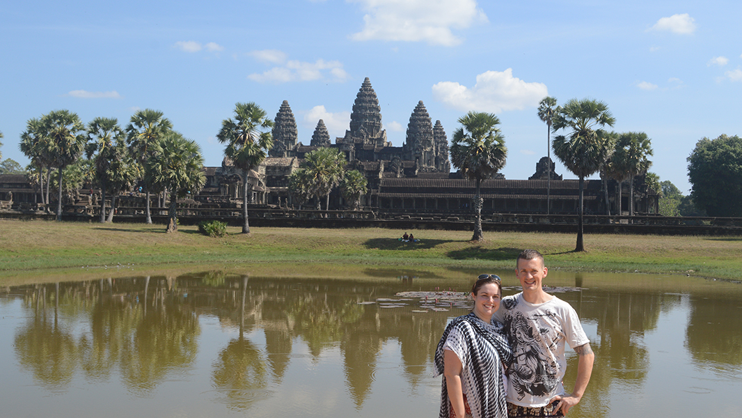The peaceful reflection pool in front of Angkor Wat offers a beautiful view of the temple’s iconic towers and showcases the elegance of Khmer architecture.