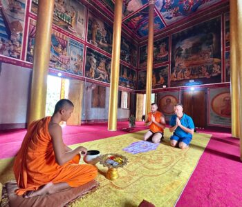 blessing by the Buddhist monk in the temple